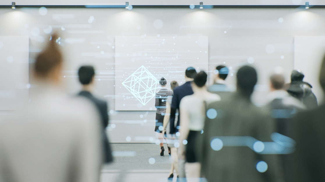 People watching an interactive technology presentation